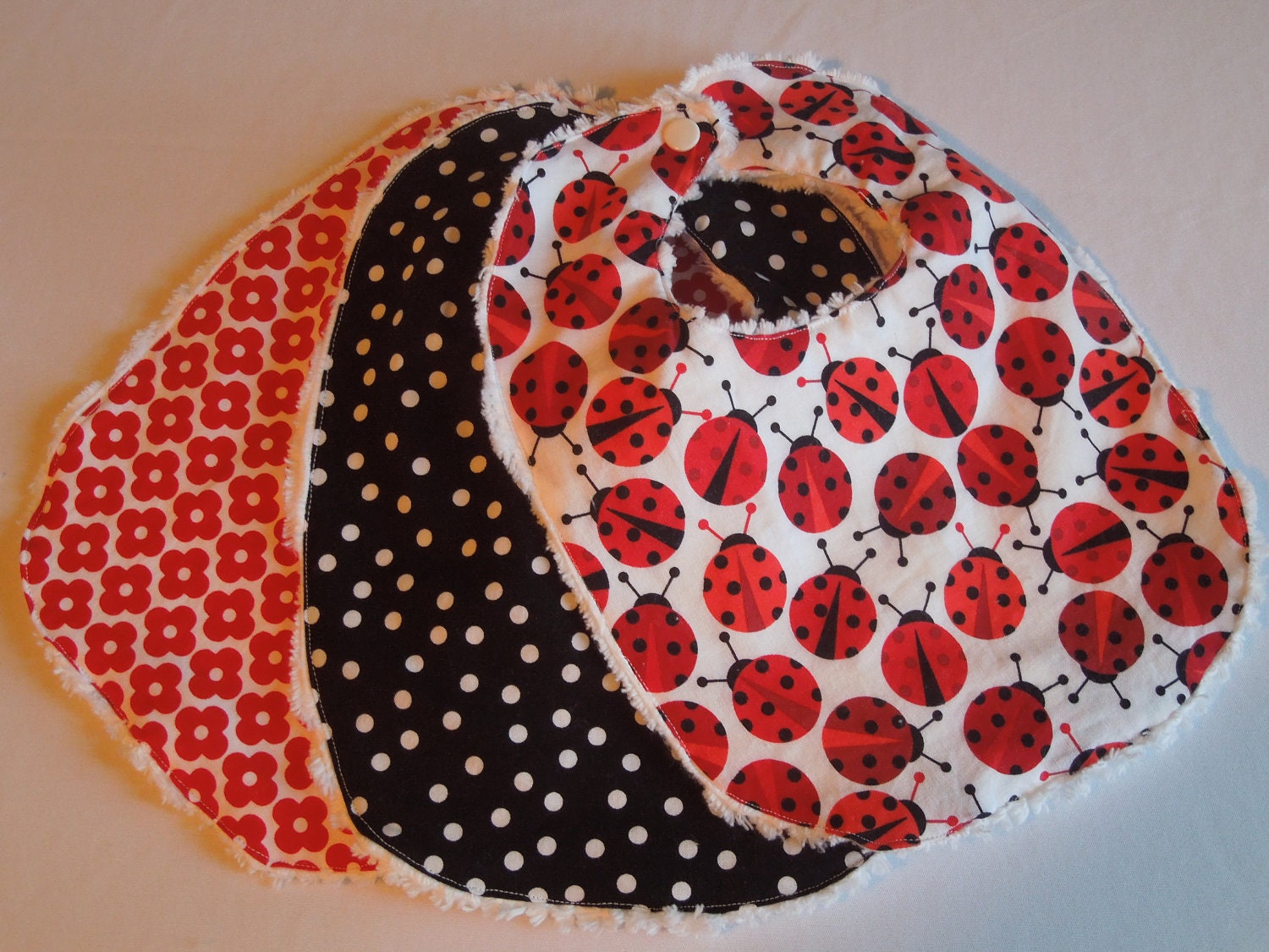 Baby Girl Bibs - Set of 3 - Urban Zoologie Ladybugs, Black Polka Dot, and Remix Red Flowers