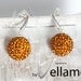 Dangling stud sterling silver earrings with large dark yellow, golden Swarovski crystal balls