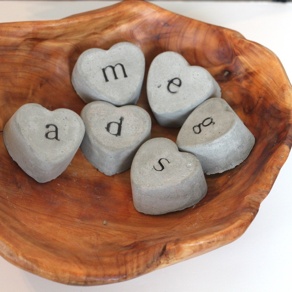 monogram decor, cement heart embedded with black letter