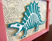 Dinobones - Dinosaur with Bones, Book Page Collage Background - Cut Paper Framed Wall Art - Green, White with Pink Frame