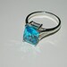 Blue topaz ring emerald cut