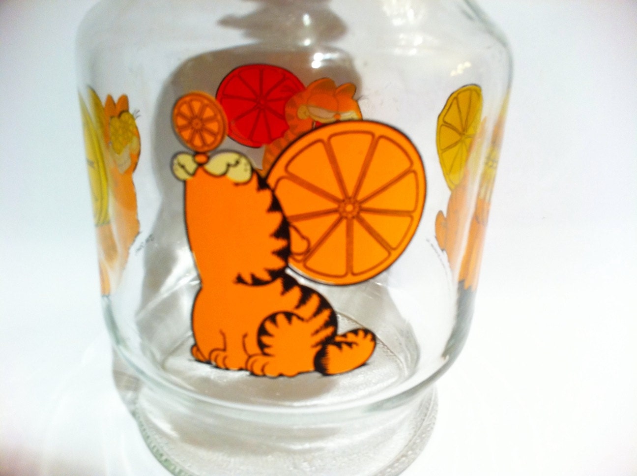 Vintage Garfield glass carafe juice pitcher with lid.