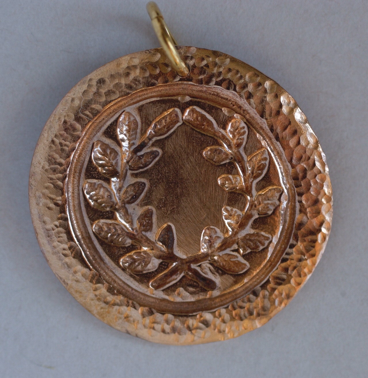 Golden Bronze Laurel Medallion with a Hand Hammered Edge Band