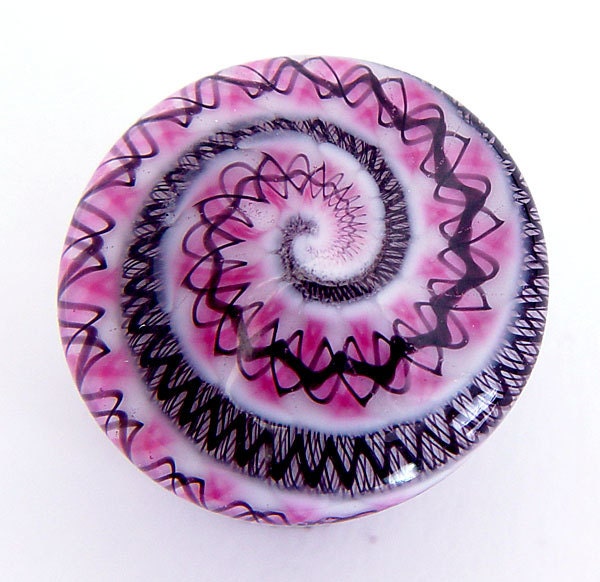 Item 2448, 22mm (.85 inches) lampwork glass button, pinkish purple/black twistie lattecino on white, self glass shank