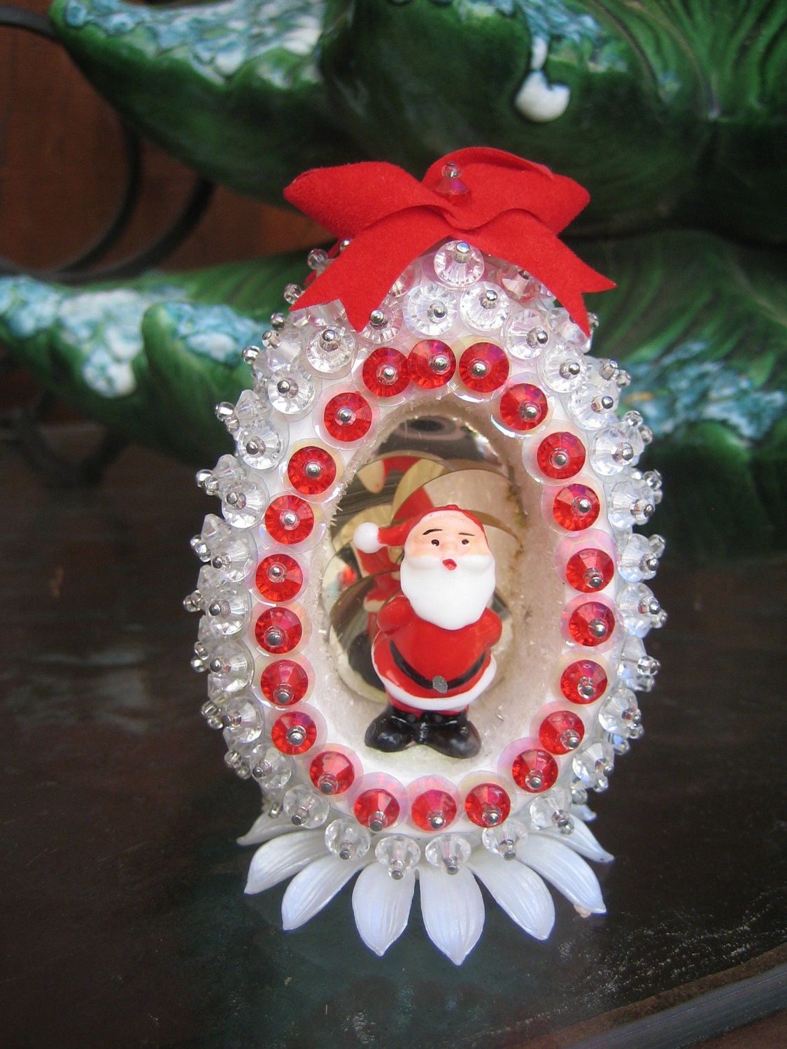 Egg shaped Christmas ornament on stand