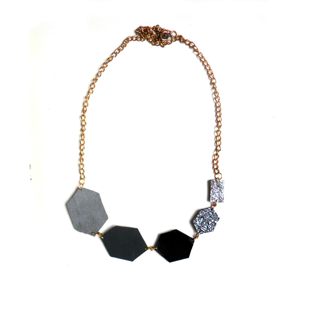 Monochrome leather necklace in grey, black and silver diamond shapes