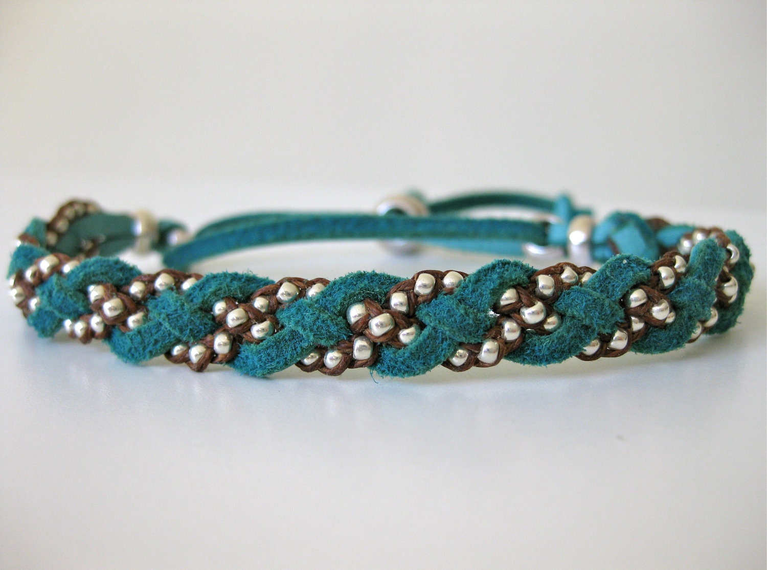 Reversible bead and leather woven bracelet