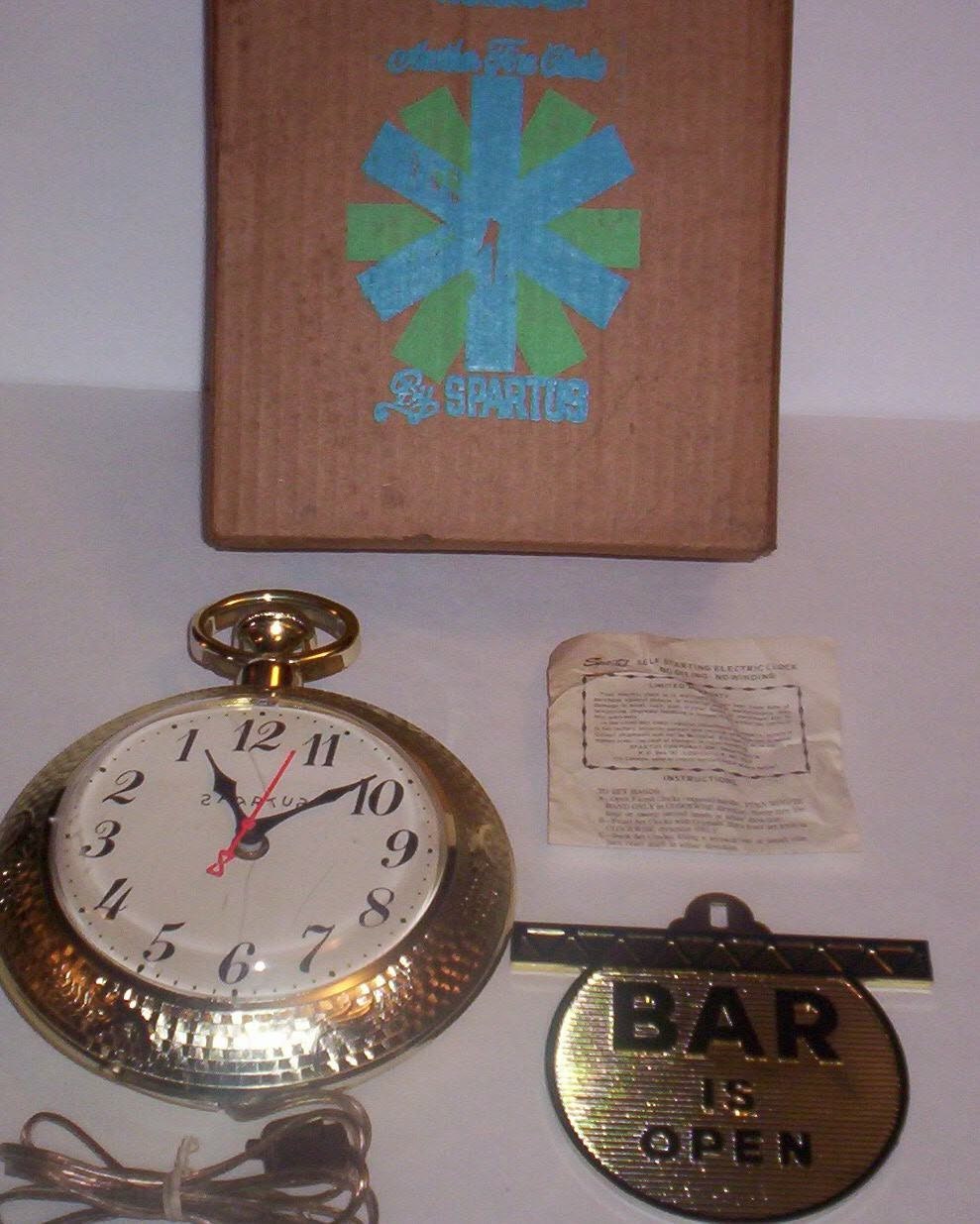 Spartus Vintage Backwards Electric Wall Clock by TwoVintageChicks