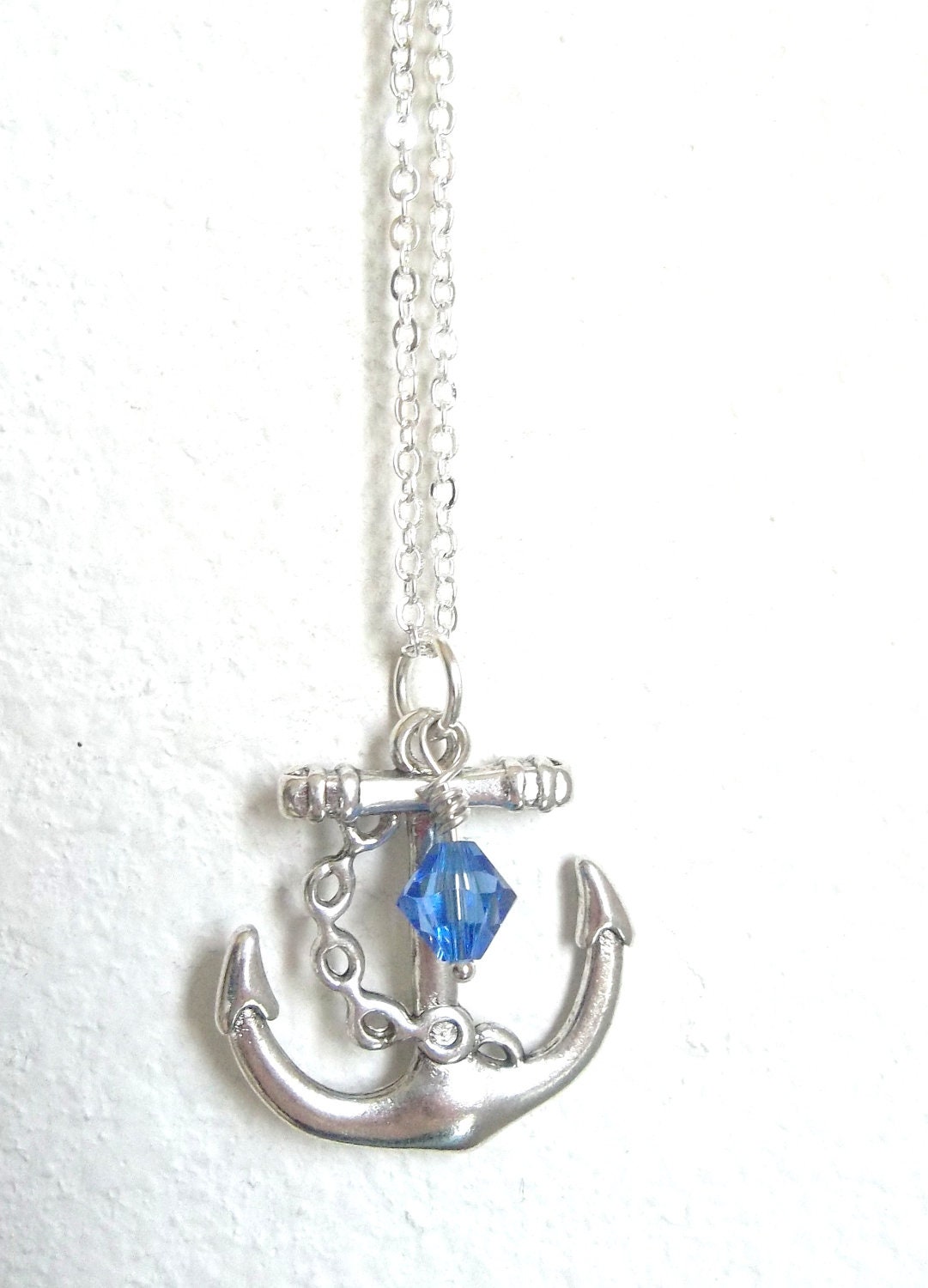 Anchor of Hope Necklace with silver anchor pendant and sapphire swarovski crystal