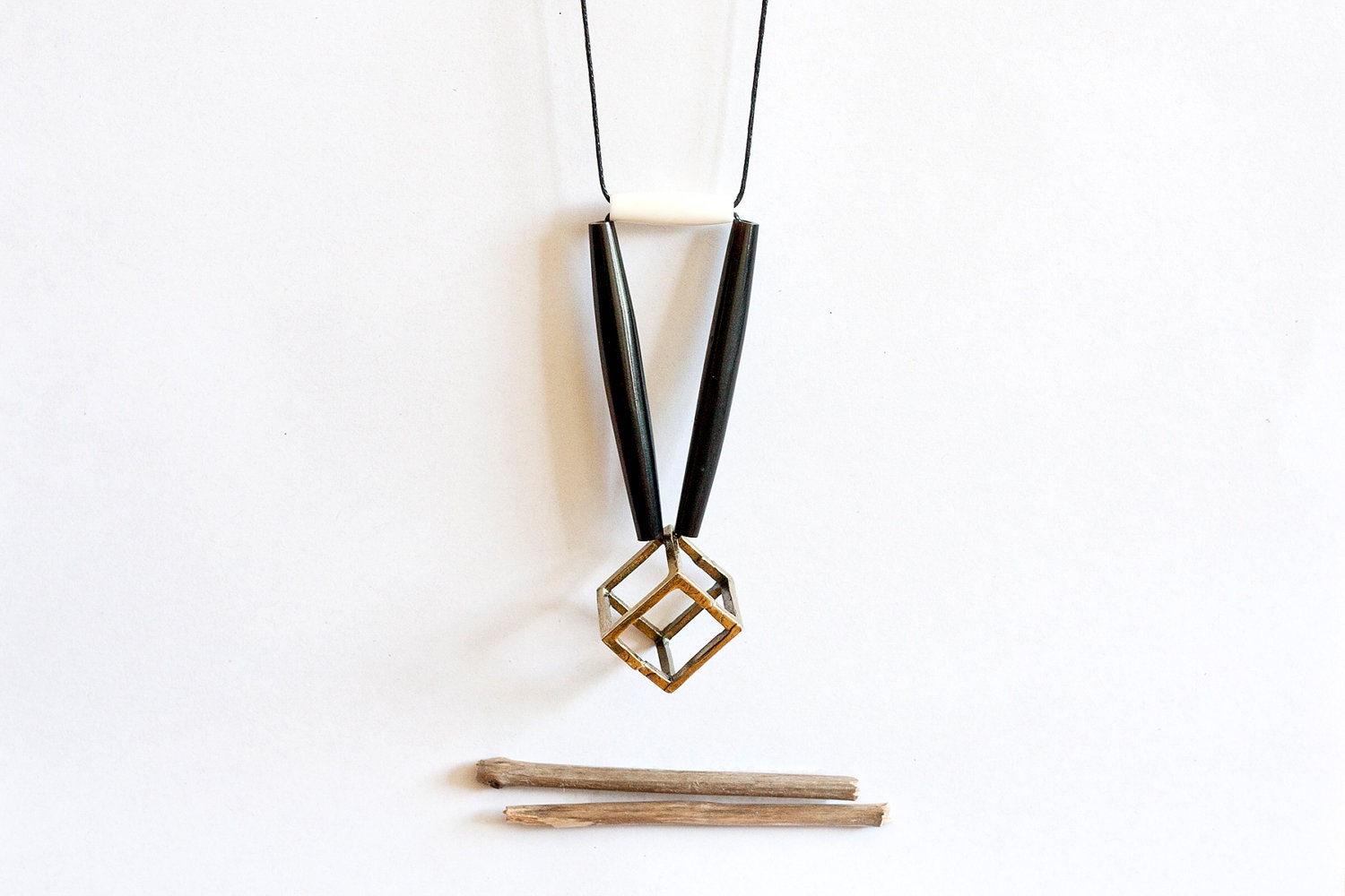 ONE LEFT geometric, tribal, metal cube, long black bone beads, white bone bead and black rope, long, beaded necklace