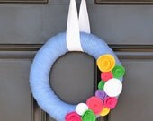Spring Yarn Wreath in Bright Blue with Mutli-Colored Flowers - Handmade Summer Wreath - 10" Yarn Wreath