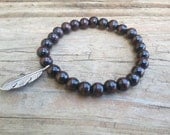 Antique silver feather charm bracelet