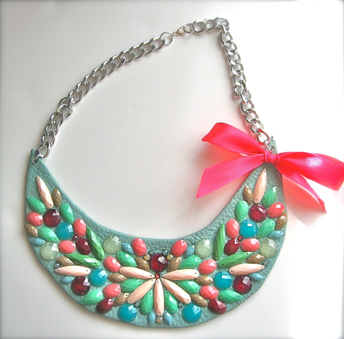 pastel statement bib necklace in mint, turquoise and pink with neon pink bow and Swarovski crystals