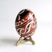 brown Trypillian Egg with Fish painted, batik style Ukrainian Easter egg pysanka