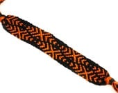 Orange and Black Friendship Bracelet handmade with knotted embroidery thread - Halloween Style Jewellery in a Double Wave Design