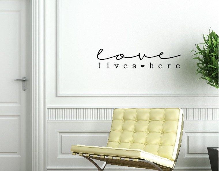 Love lives here. Custom Vinyl Wall Decal.
