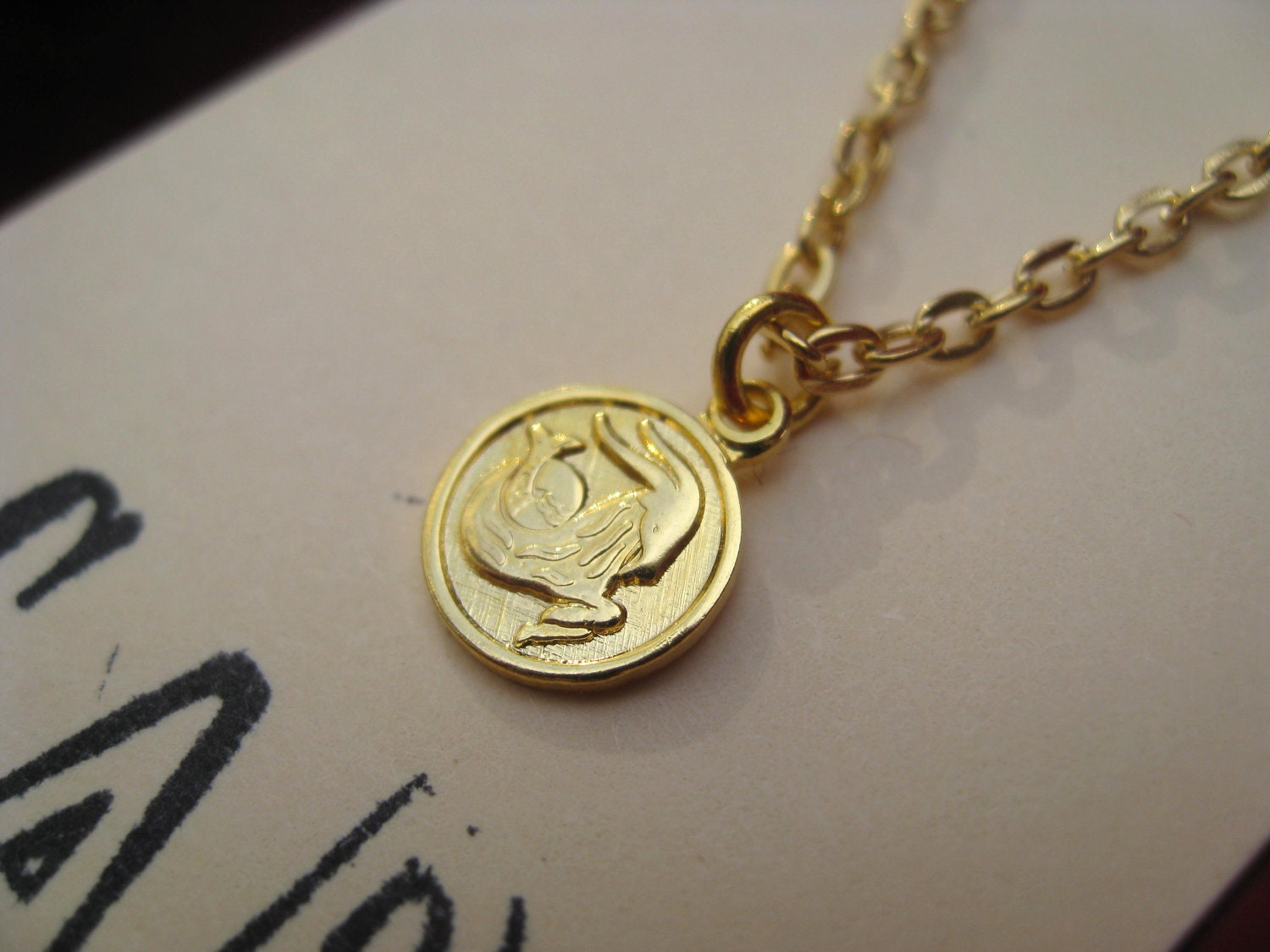 CAPRICORN // tiny zodiac charm necklace.