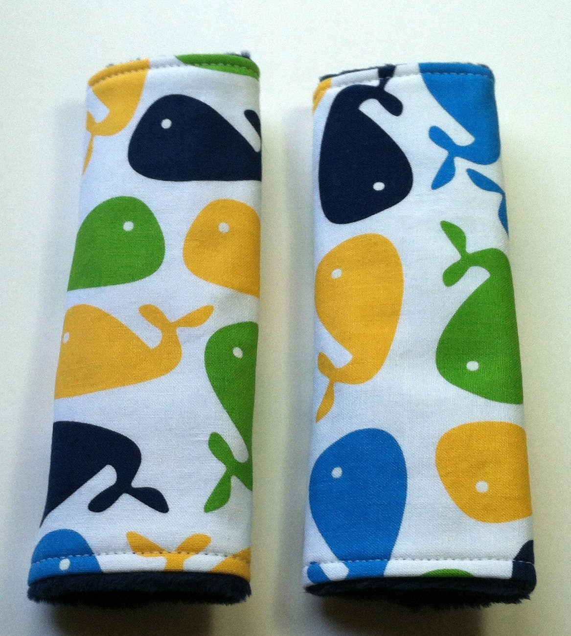 Car Seat Strap Covers - Reversible - Urban Zoologie Whales on Navy Blue Minky Dot