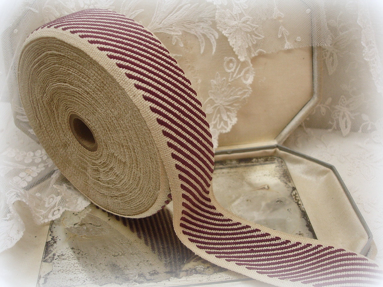 vintage spool cotton twill tape . two tone . natural with burgundy diagonal stripes . lots of yards