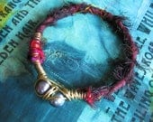 From the ashes - fresh water pearl and silk hand forged bangle