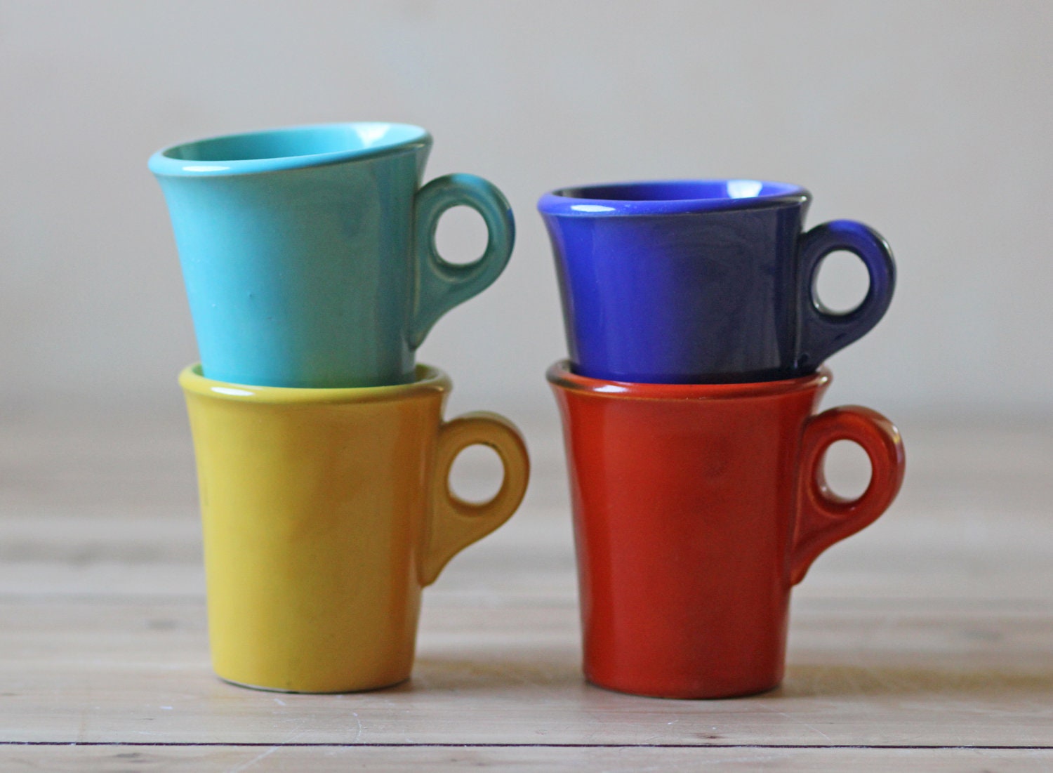 four vintage coffee cups