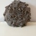 Merino Ruffle Rose Pillow in Textured Taupe. Eco friendly recycled materials. 16" medium