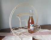 Retro bottle rack glasses holder carrier with handle - chippy yellow paint arched made of metal sunny summer time