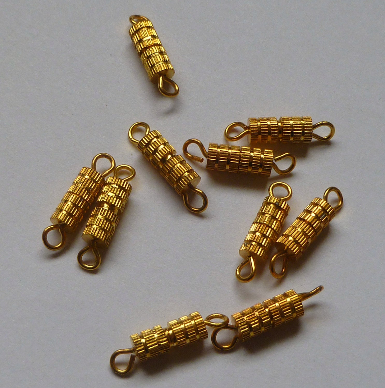 Clasp, barrel, gold-finished brass, 9x4mm. Sold per pkg of 10.
