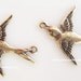 Brass Ox Flying Bird Charm