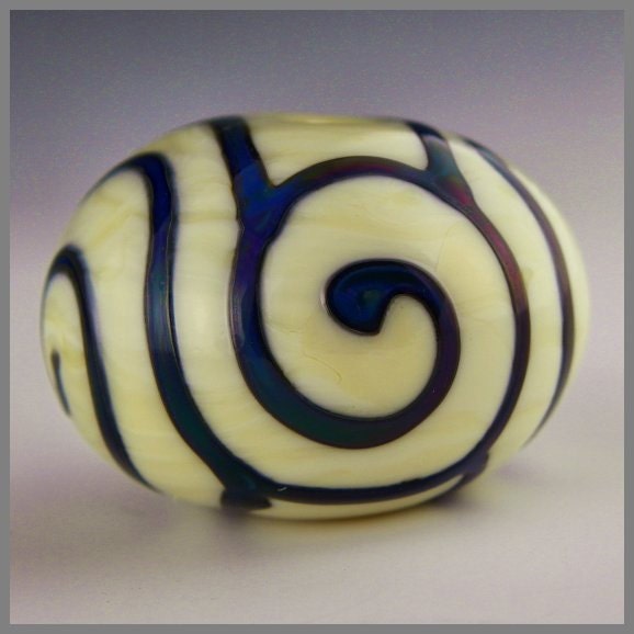 a large hollow handmade focal glass lampwork dark ivory with iridescent scrollwork - Ivory Hollow