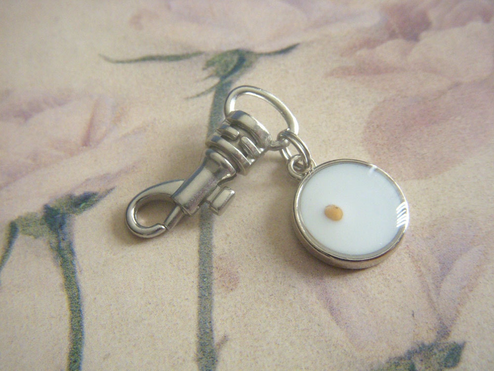 faith as small as a mustard seed -round resin mustard seed pendant charm, zipper pull, or keychain