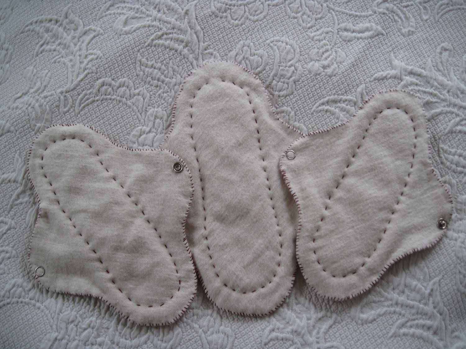 One large and Two small 100% organic cotton Menstrual Pads