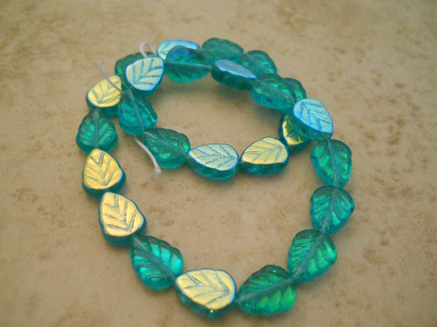 Czech glass Teal AB glass leaf beads 8x10 mm Item 1418