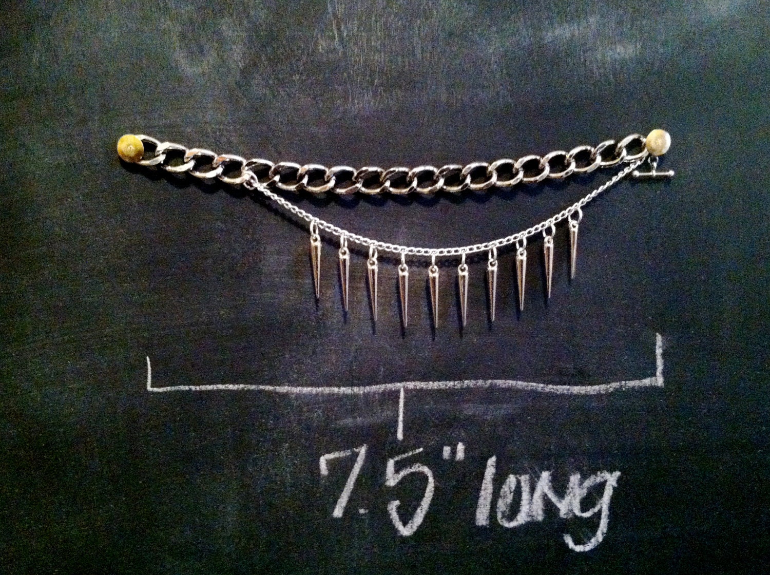silver spike and multichain bracelet