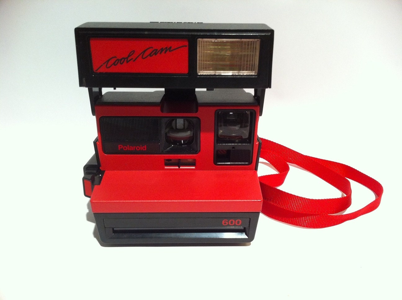 Vintage Polaroid Cool Cam 600 red camera. 1980s.