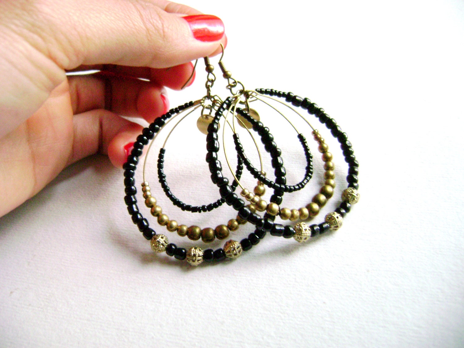 Sophistic - intense black and golden antique bronze long big earrings
