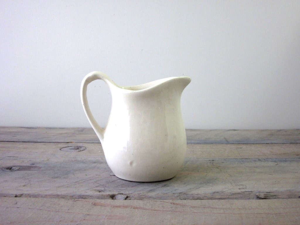 Creamy White Pottery Pitcher