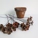 Rusty Metal Flowers Bloom Forever In Repurposed Rustic Bouquet