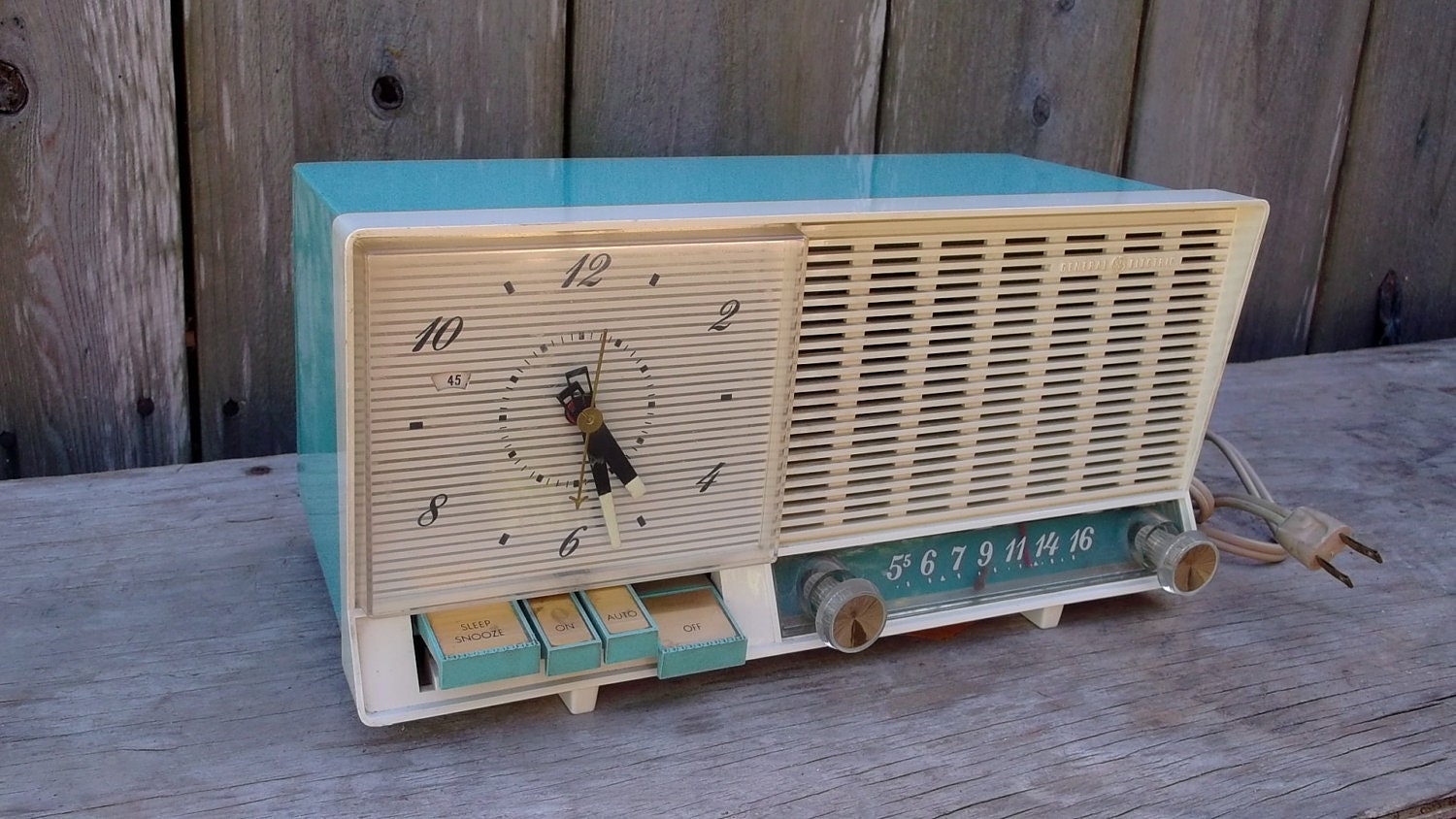 vintage 50s clock radio mid century GE turquoise radio