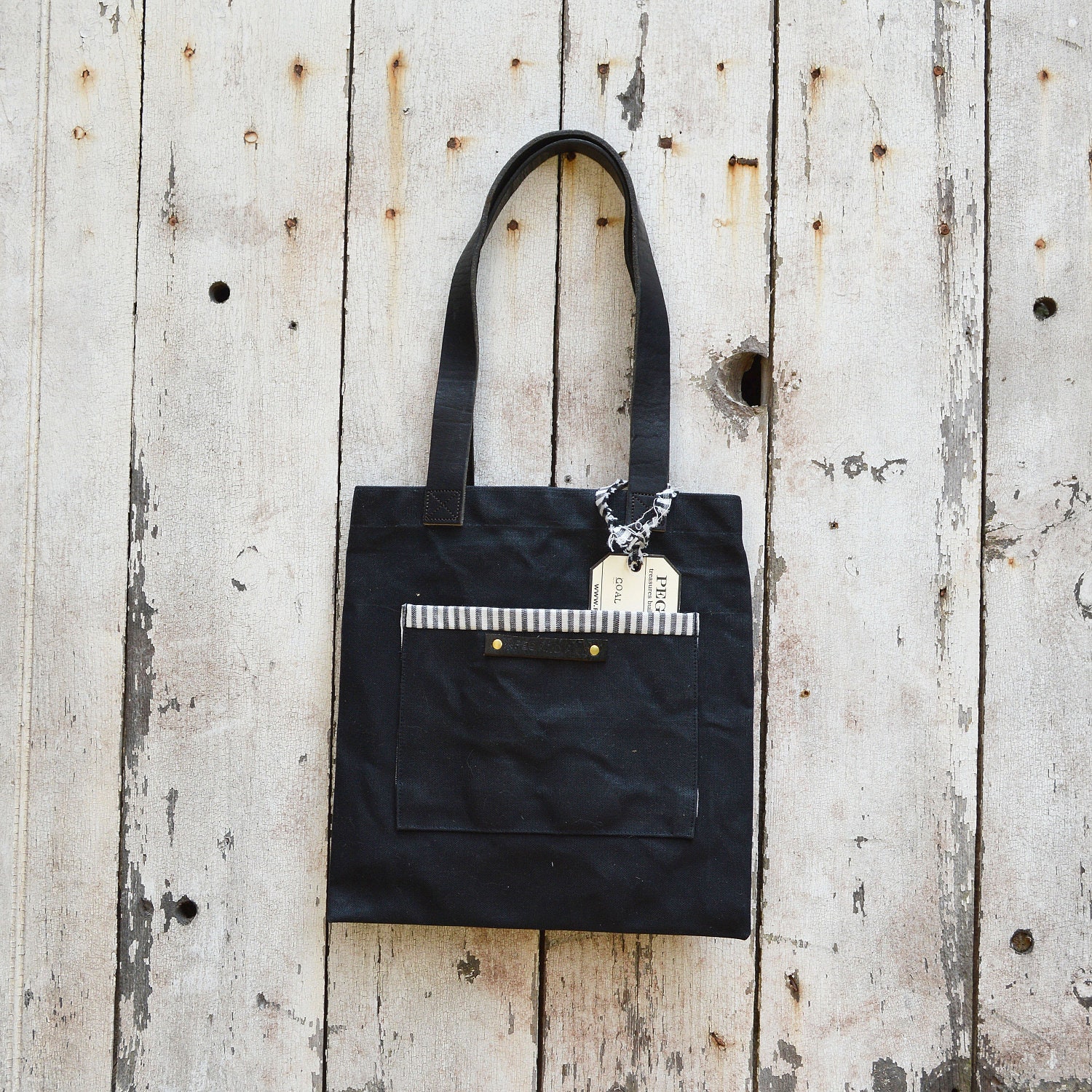 Waxed Canvas Reader: Coal, antique military leather, antique fabric.