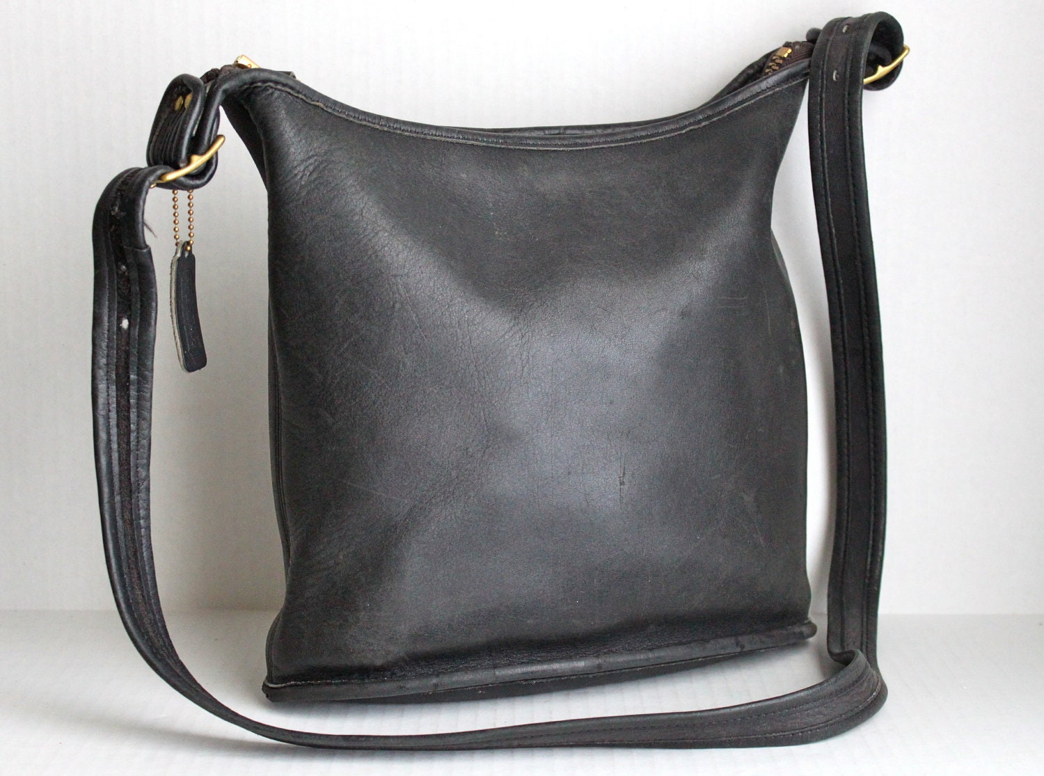 vintage Coach New York City cross body leather bag in distressed black // duffle