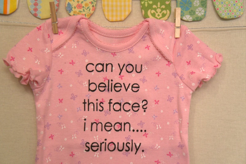 can you believe this face --- pink patterned onesie, size 6 - 9 months
