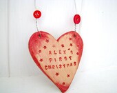 Customised "Baby's First Christmas" ceramic Heart. Ideal gift. Handmade in Wales UK
