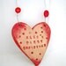 Customised "Baby's First Christmas" ceramic Heart. Ideal gift. Handmade in Wales UK