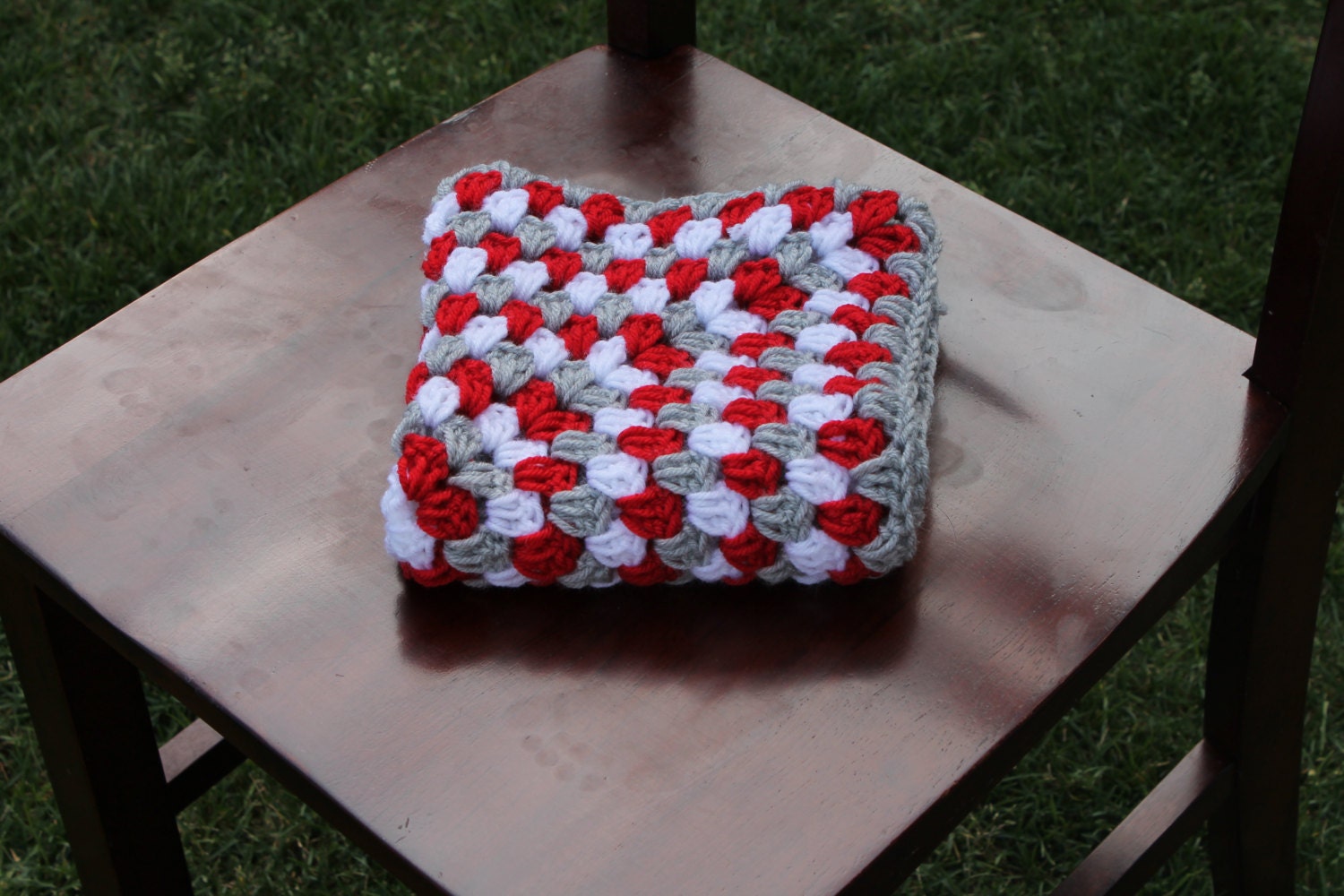 mini blanket in red and grey. mini granny square photography prop blanket