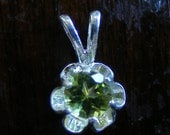 Peridot and sterling buttercup pendant.