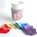 Coffee Cozy with 4 interchangeable flowers by The Cozy Project