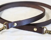 Long leather strap with a swivel snap hook (at each end) - 45" long x 1/2" wide