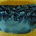 The Haven..Pretty in Peacock 2 Piece Satin Top with Satin Rolled Flowers and Floor length Peacock Tutu Skirt...