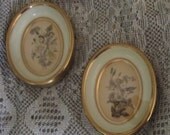 Vtg Pair oval floral wall decor pen and ink  look style sepia tones gold frame glass front
